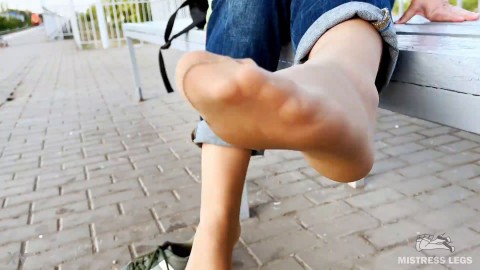 Tan Nylon Soles With Blue Jeans Teasing On The Bench